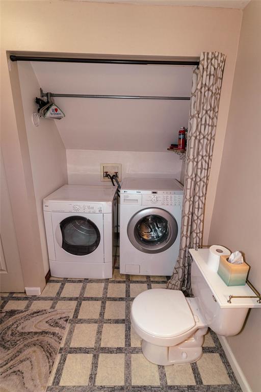 Image 34 of 46: laundry is in the upstairs bathroom