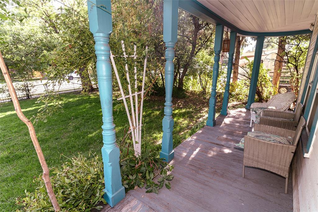 Image 4 of 46: Front wrap-around porch