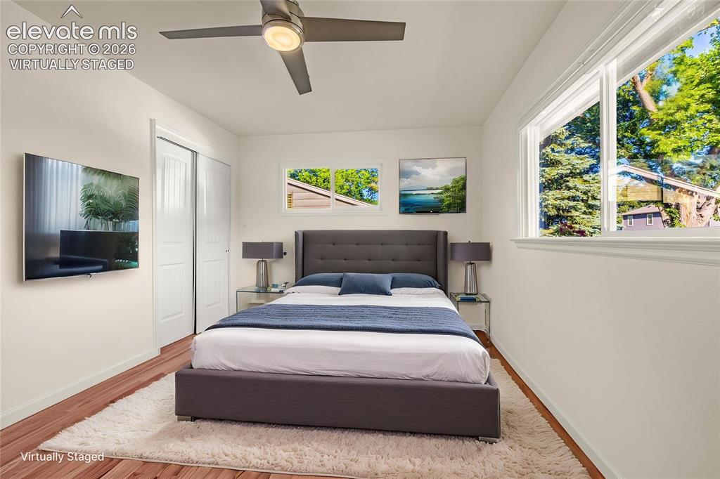 Image 13 of 43: Virtually Staged Primary Bedroom, main level