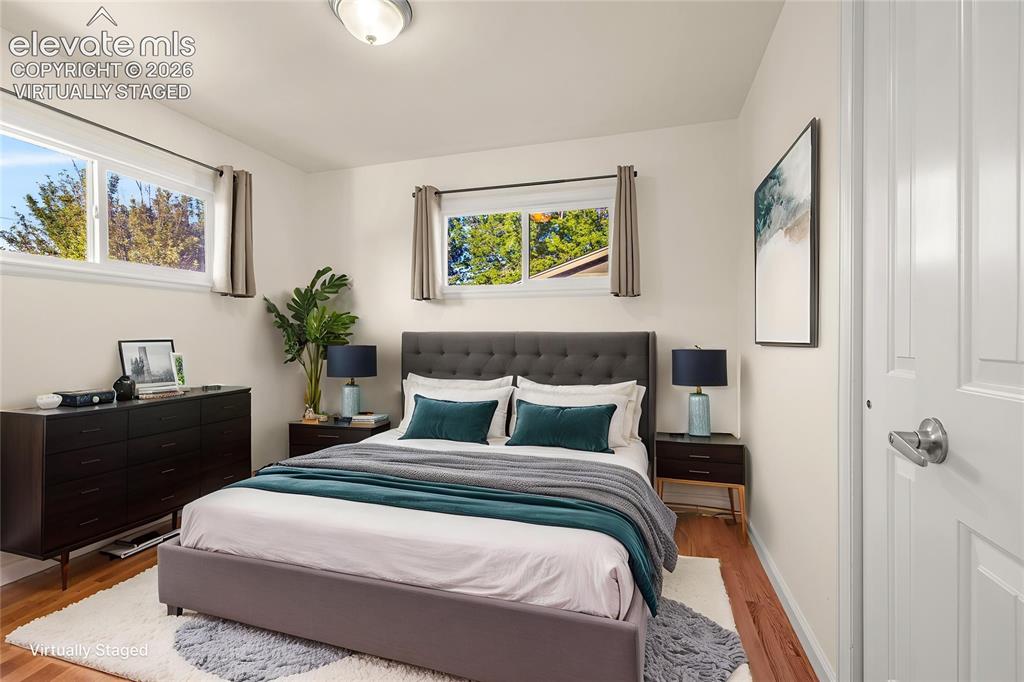 Image 16 of 43: Virtually Staged 2nd bedroom, main level