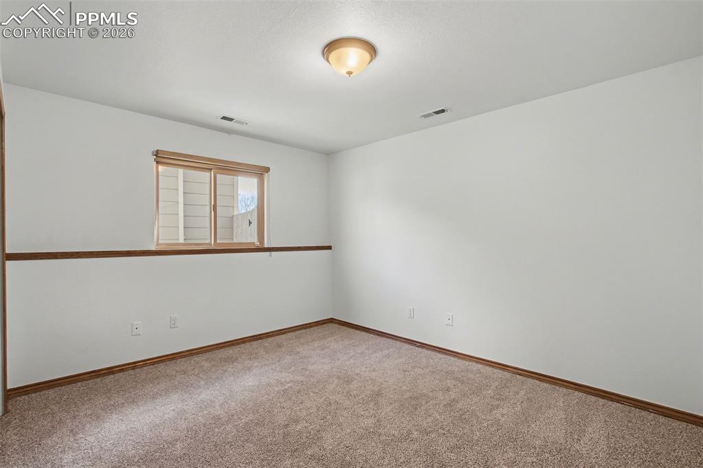 Image 32 of 43: Bedroom