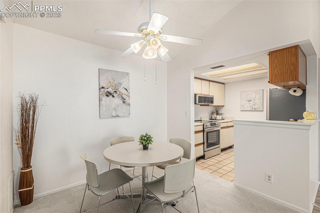 Image 6 of 19: Open dining area, convenient to kitchen and living room