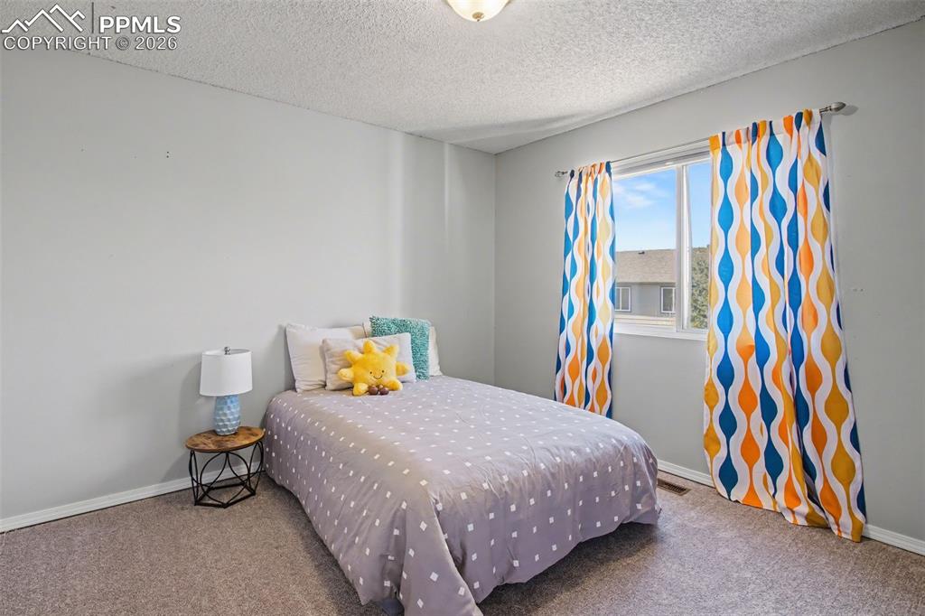 Image 26 of 37: Bedroom