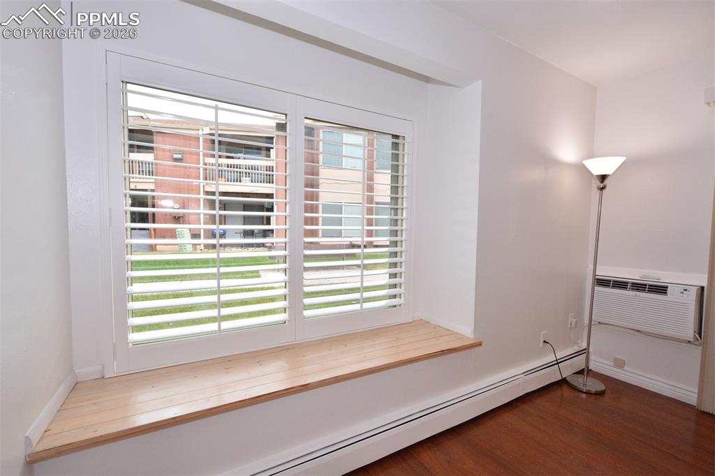 Image 12 of 20: Custom Window Bench in Living Room
