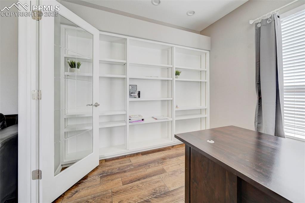 Image 14 of 31: Unfurnished office with light wood-style floors