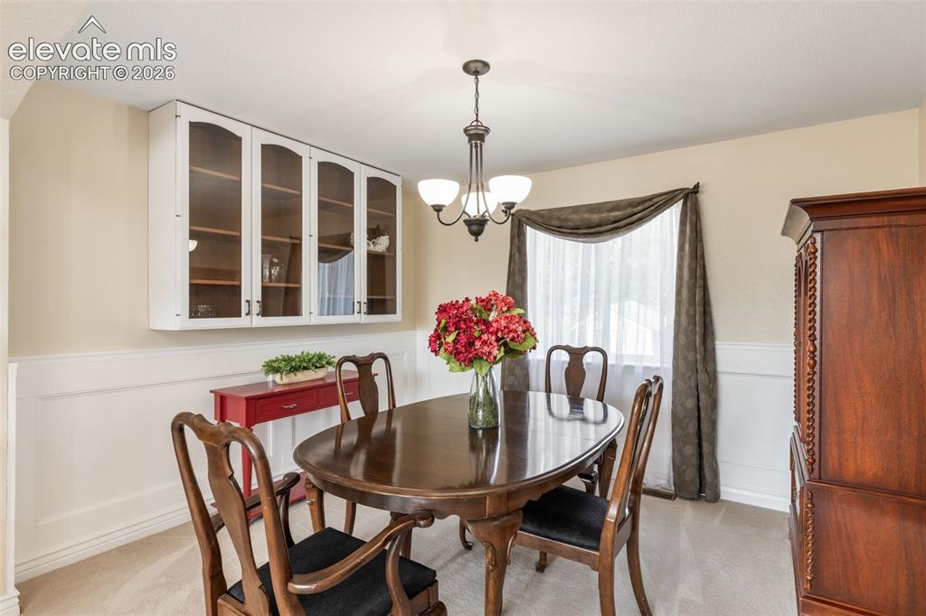 Image 7 of 47: Dining room with ample space for large table and additional seating.