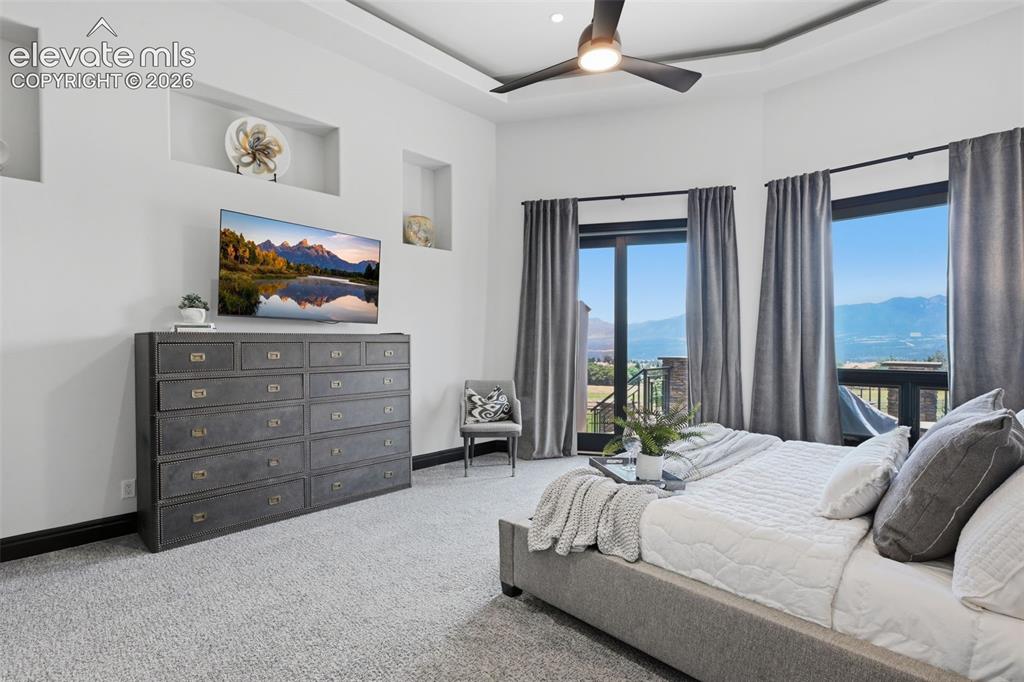 Image 23 of 48: Master bedroom retreat views and walk out to deck!