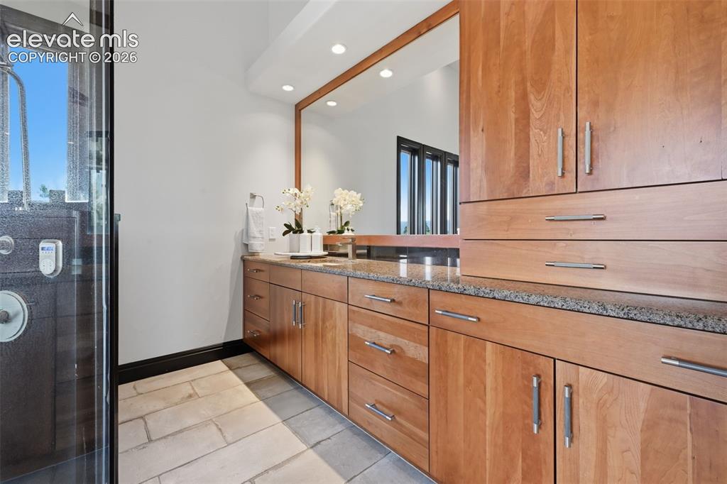 Image 25 of 48: Another view of the spa like master bath with separate counter areas and fu