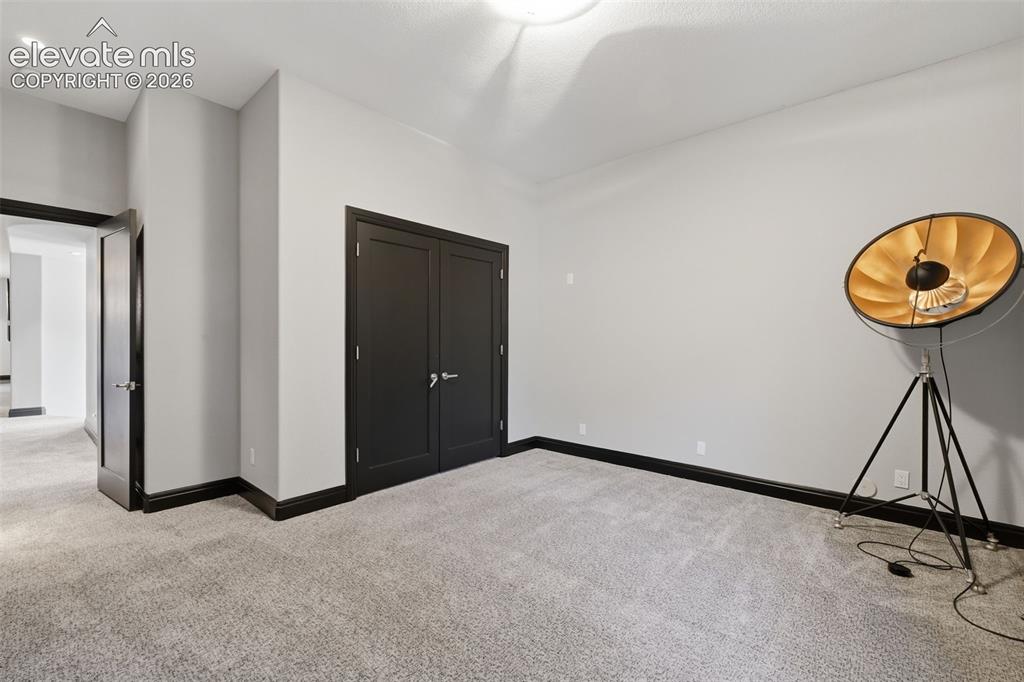 Image 39 of 48: Bedroom #4 in the basement with Jack-n-Jill bath!