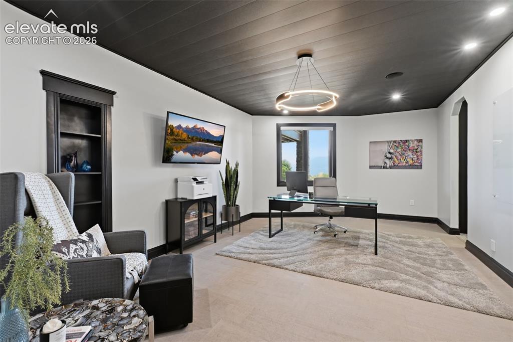 Image 40 of 48: Bedroom #4 in the basement is a junior master retreat!