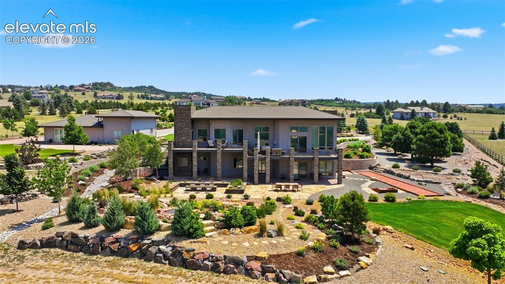 Image 7 of 48: What an amazing back yard! Water features in every direction! Full length