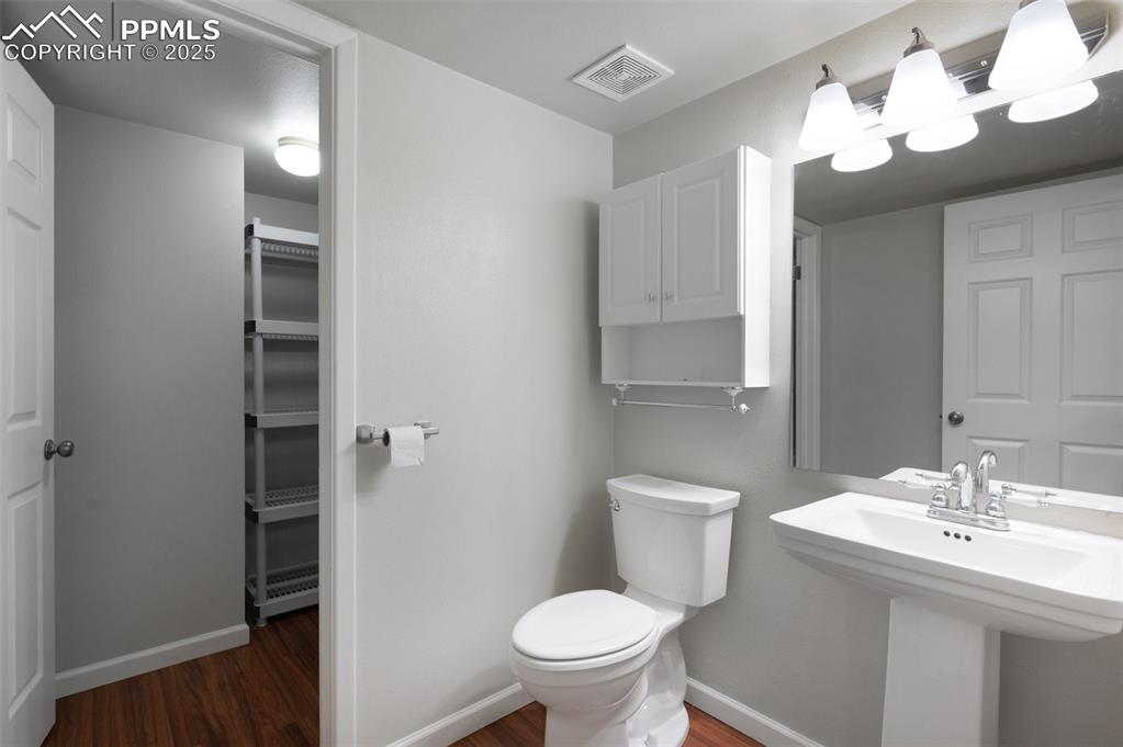 Image 11 of 39: Half bath on main level