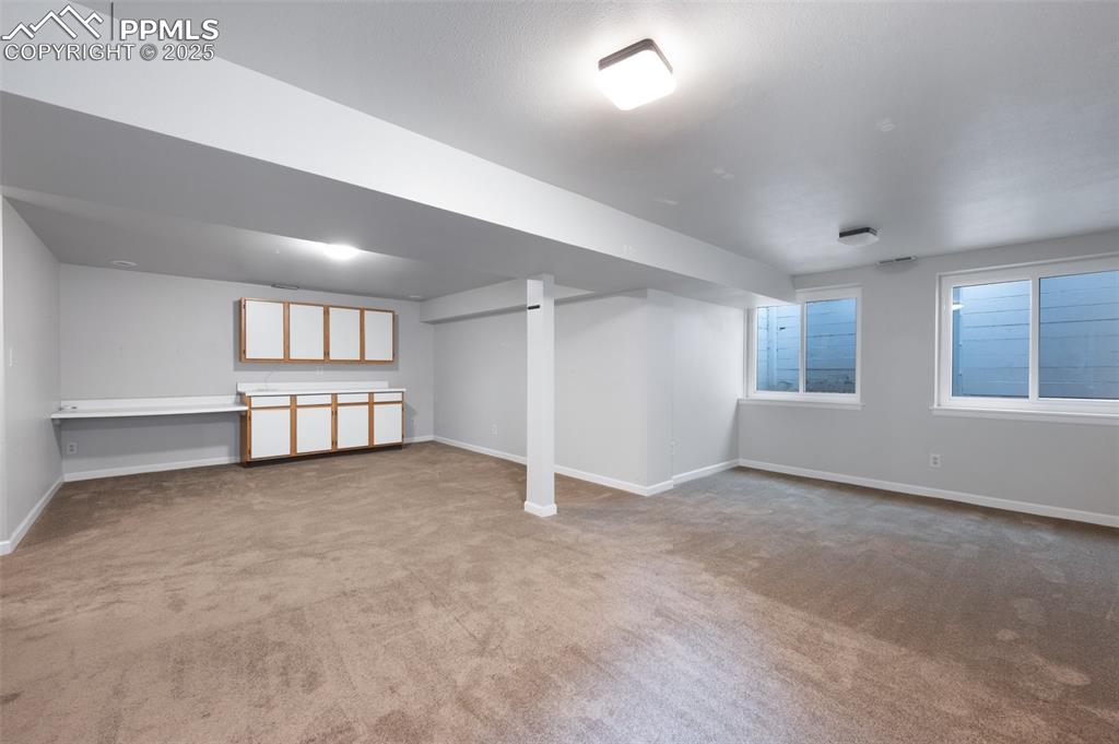 Image 25 of 39: Large basement family room