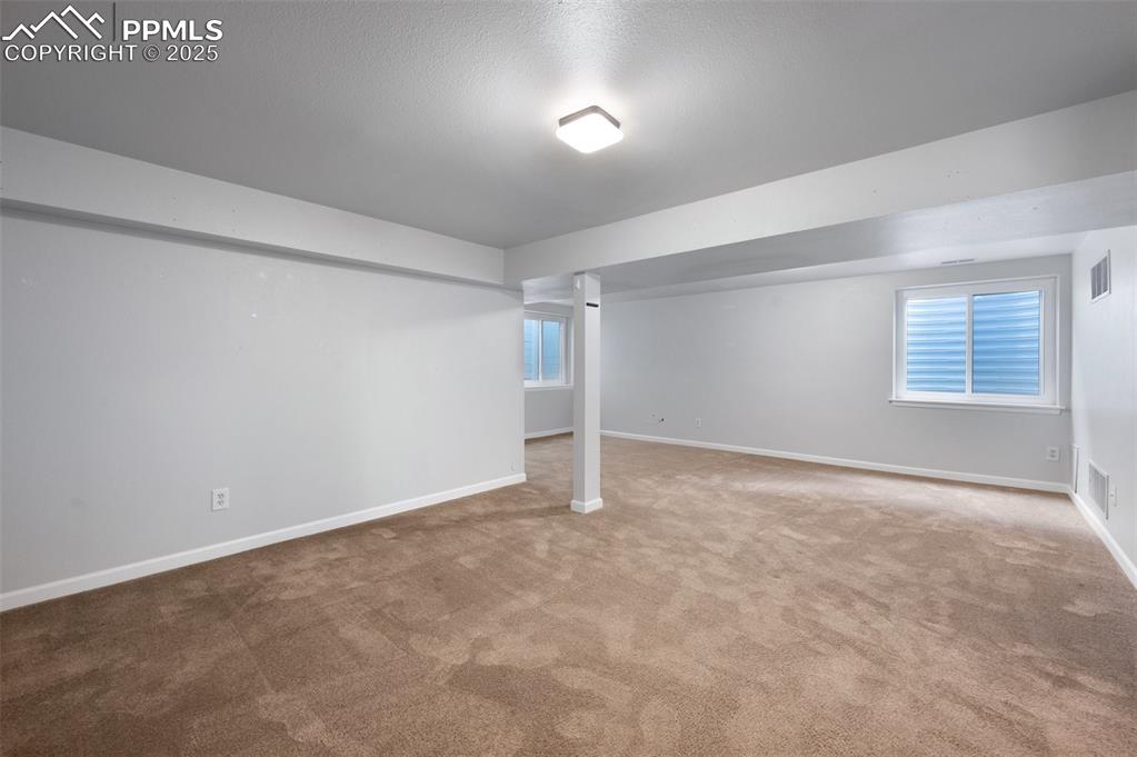 Image 26 of 39: Basement family room