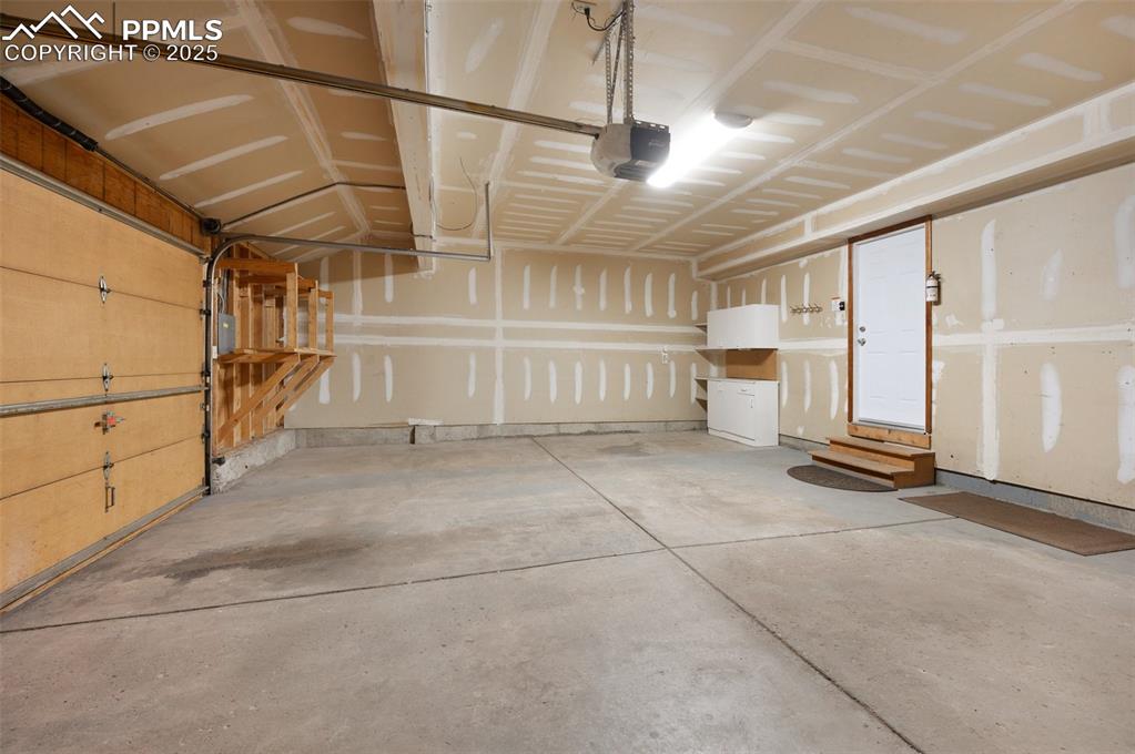 Image 28 of 39: OVERSIZED 2 car garage!!!