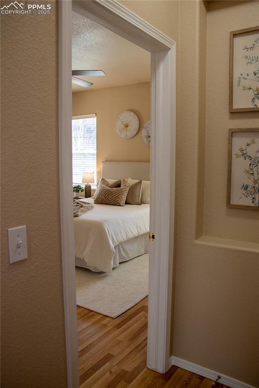 Image 14 of 31: Bedroom featuring wood finished floors