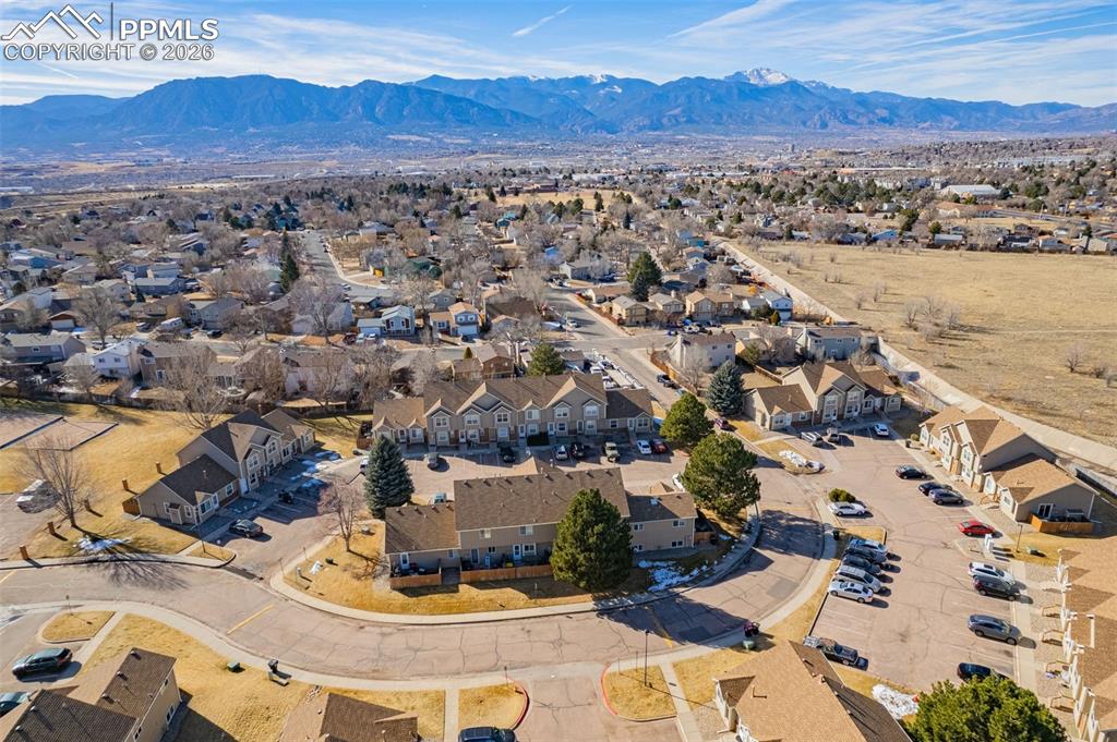 Image 28 of 35: Lower level family room with fireplace