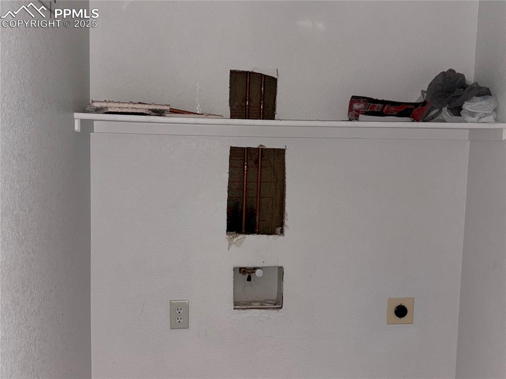 Image 13 of 19: Laundry room leak fixed