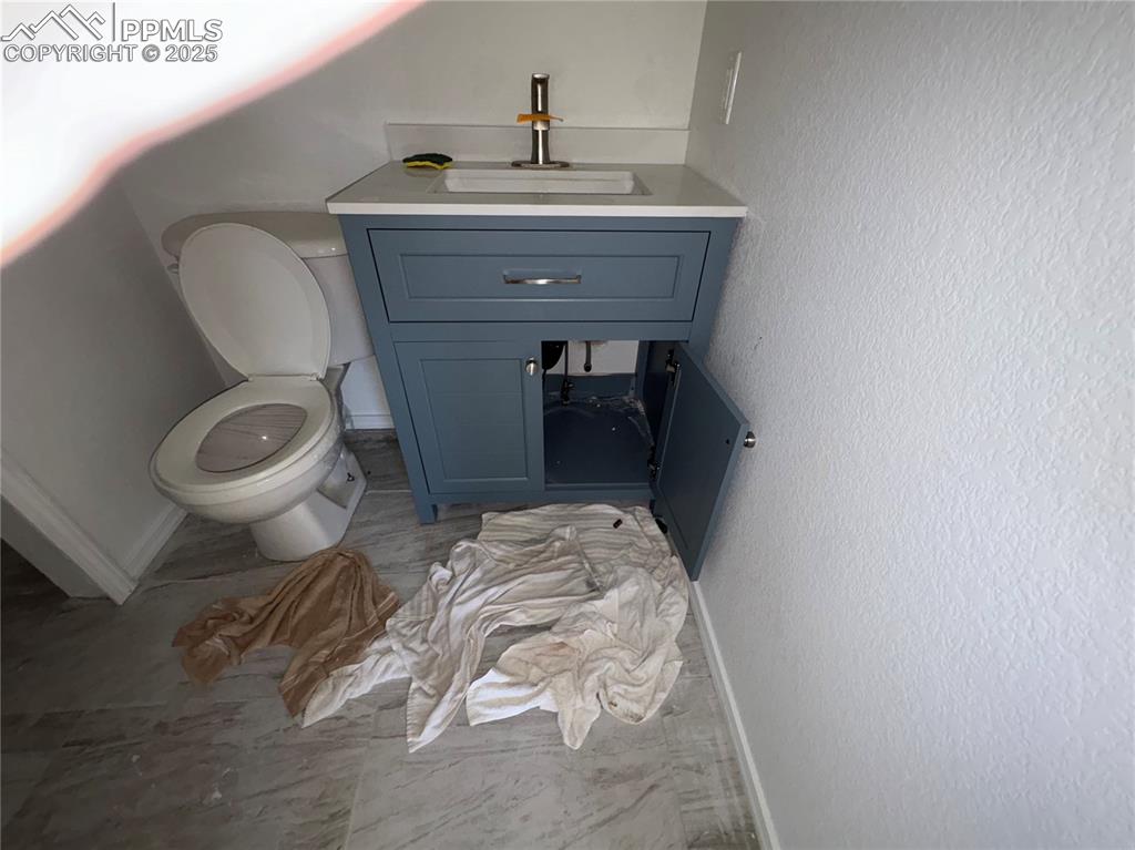 Image 14 of 19: lower bathroom leak fixed