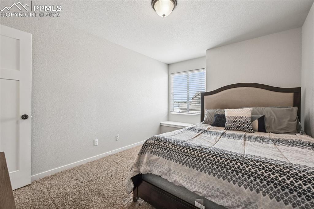 Image 22 of 38: Bedroom