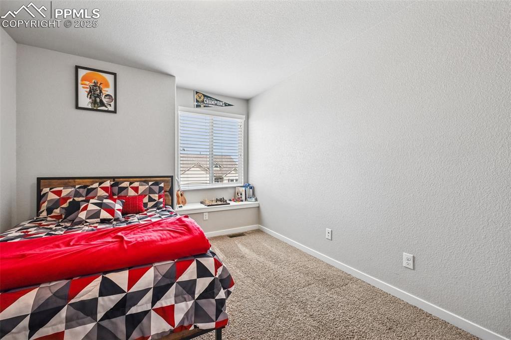 Image 25 of 38: Bedroom