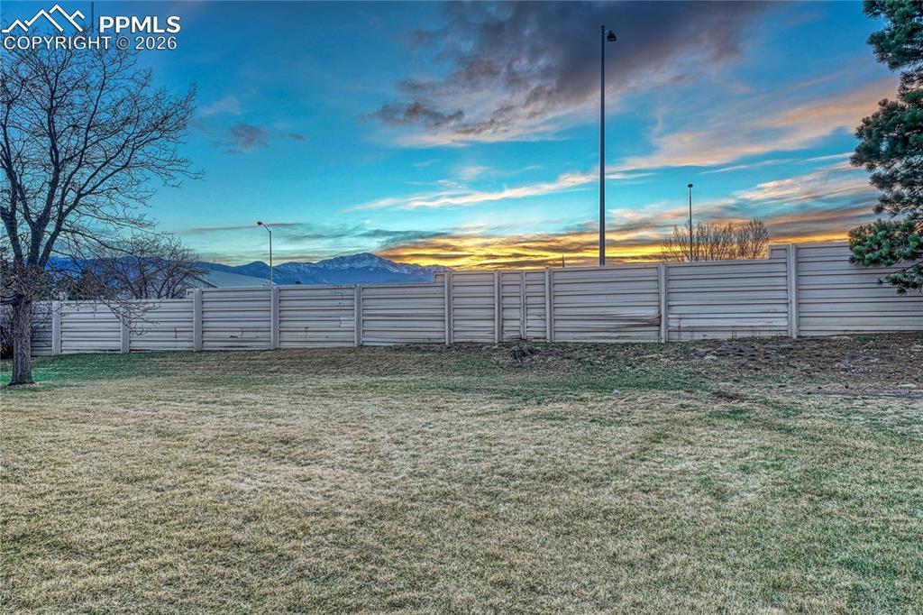 Image 40 of 50: Sprawling backyard with views