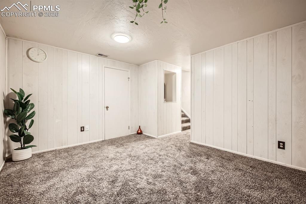 Image 22 of 31: Family room in basement