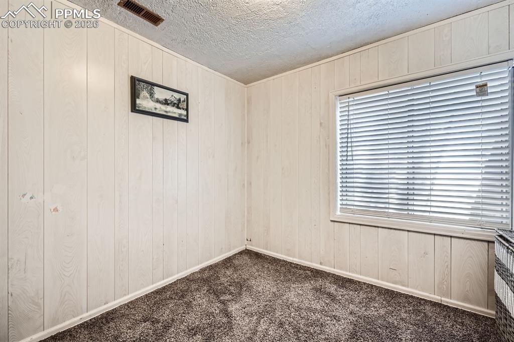 Image 25 of 31: Basement bedroom