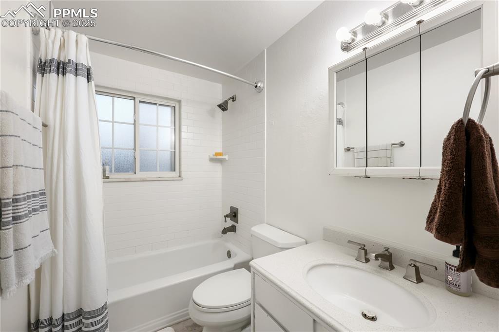 Image 13 of 32: Upstairs Bathroom 