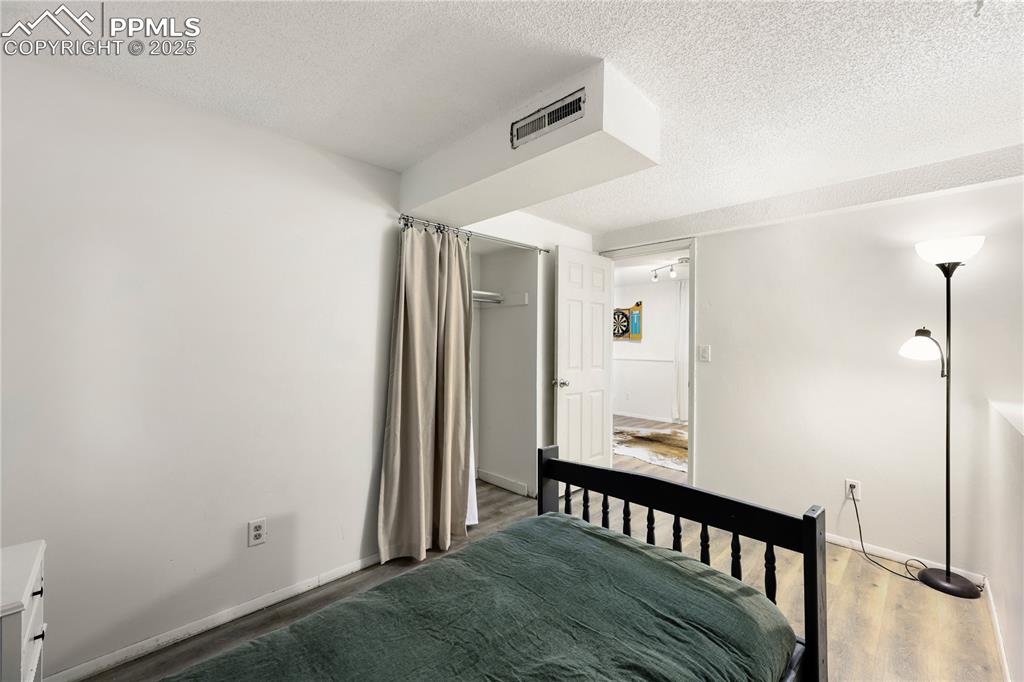 Image 21 of 32: Lower level bedroom 