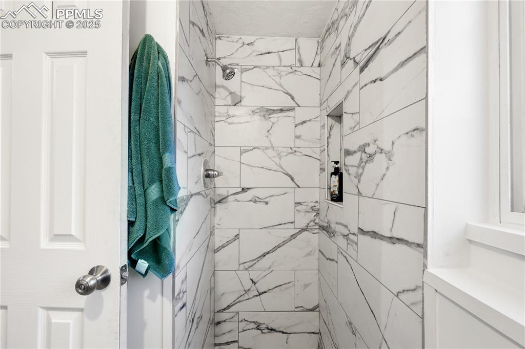 Image 23 of 32: lower level 3/4 bath