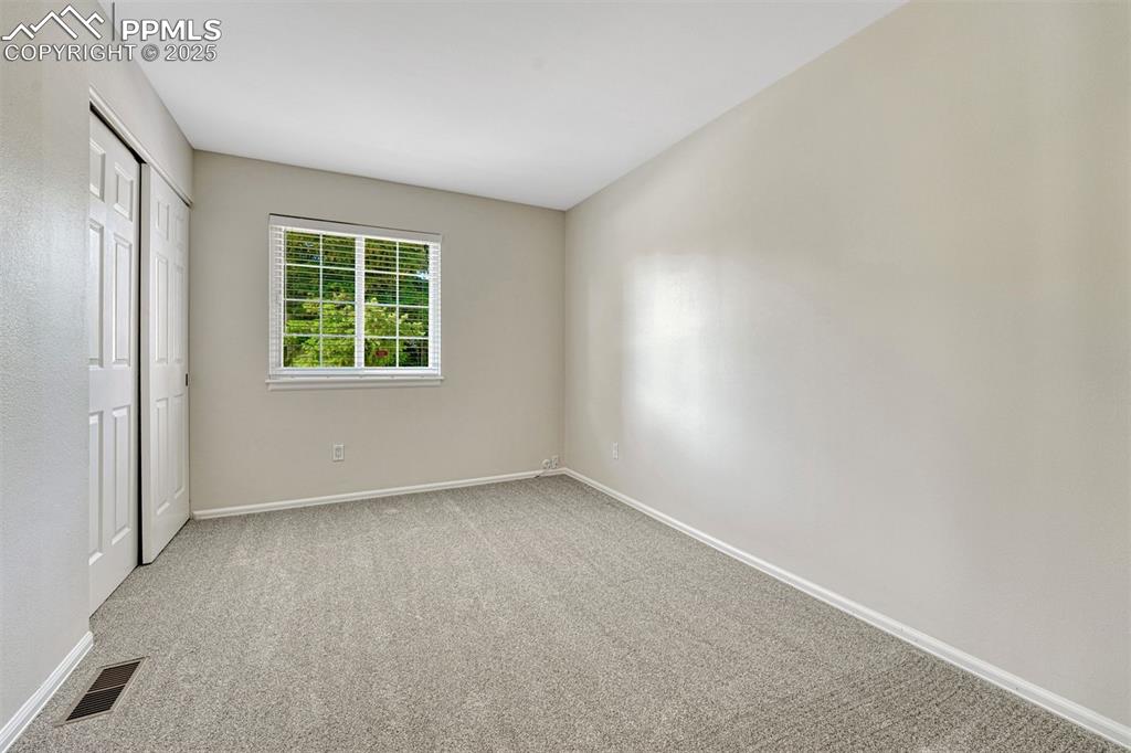 Image 19 of 50: Main level bedroom