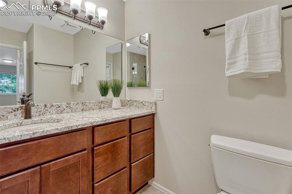Image 8 of 50: Large Vanity in the Primary Bathroom