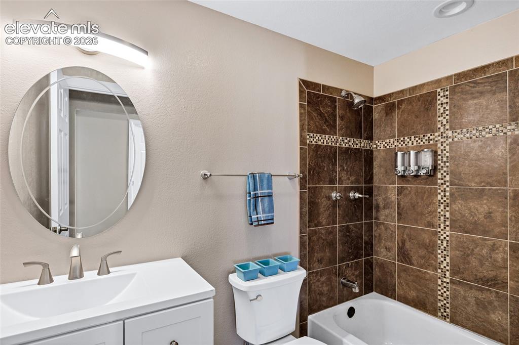 Image 12 of 46: Room with fresh wall paint and new carpet flooring