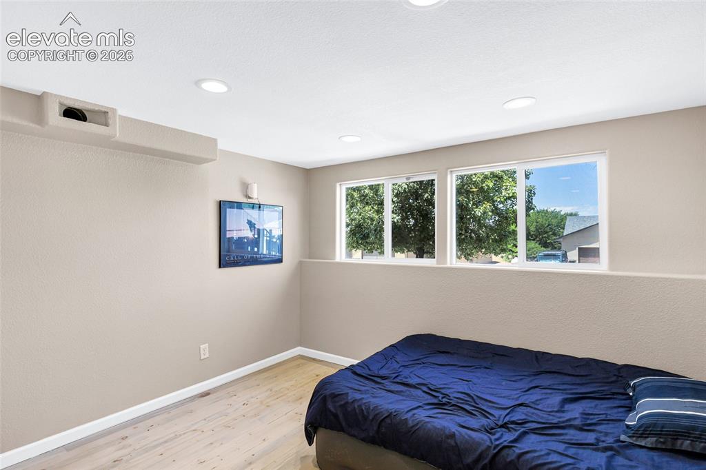 Image 24 of 46: Theater/Game room Complete with projector pre-wired ceiling and surround so