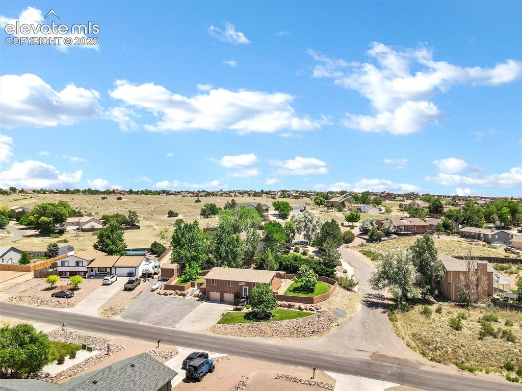 Image 39 of 46: Residential neighborhood featuring a mix of single-story and two-story home