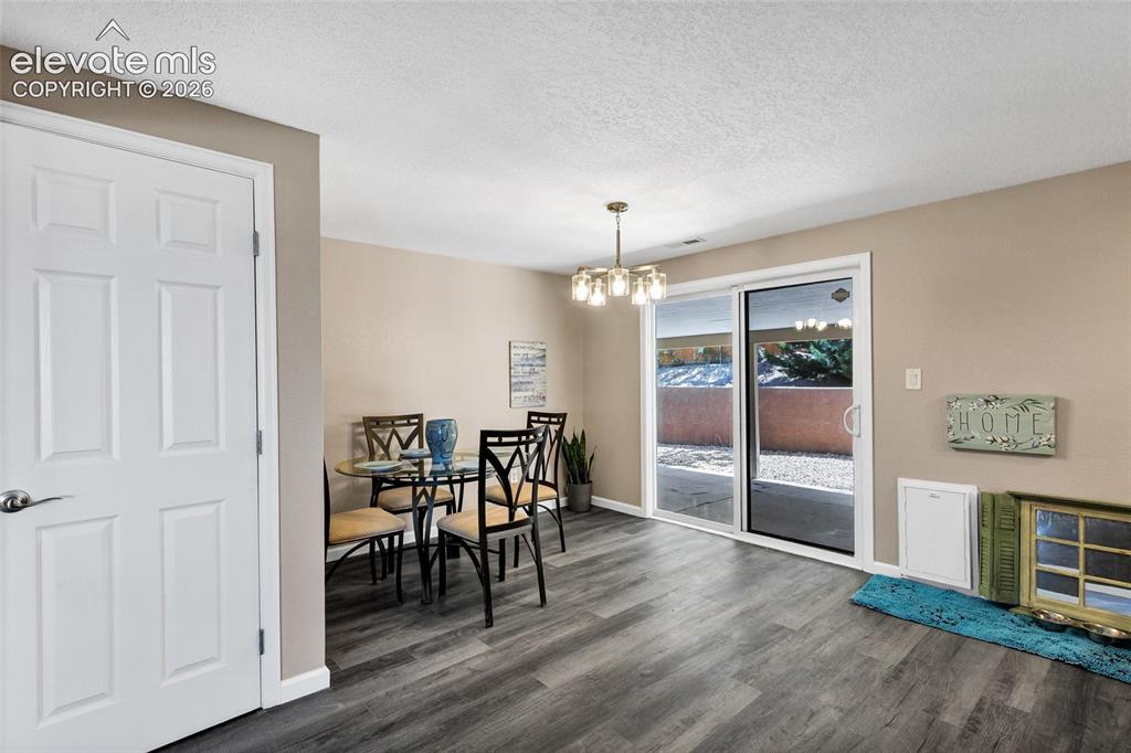 Image 6 of 46: Plenty of room for the big screen TV and a sectional sofa facing the it OR 