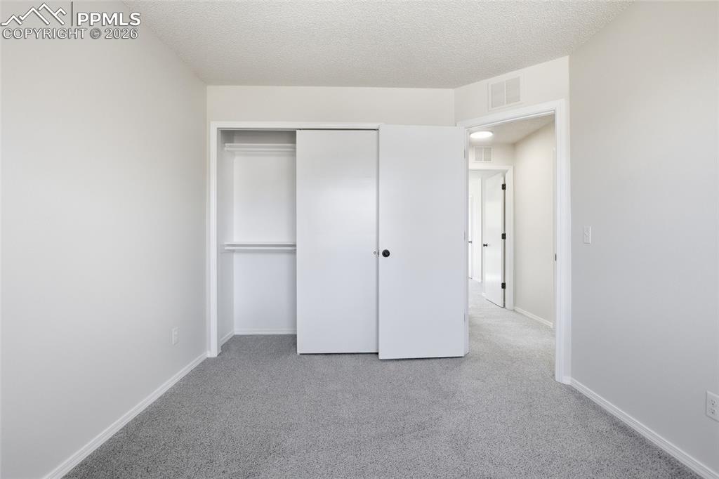 Image 23 of 36: Bedroom