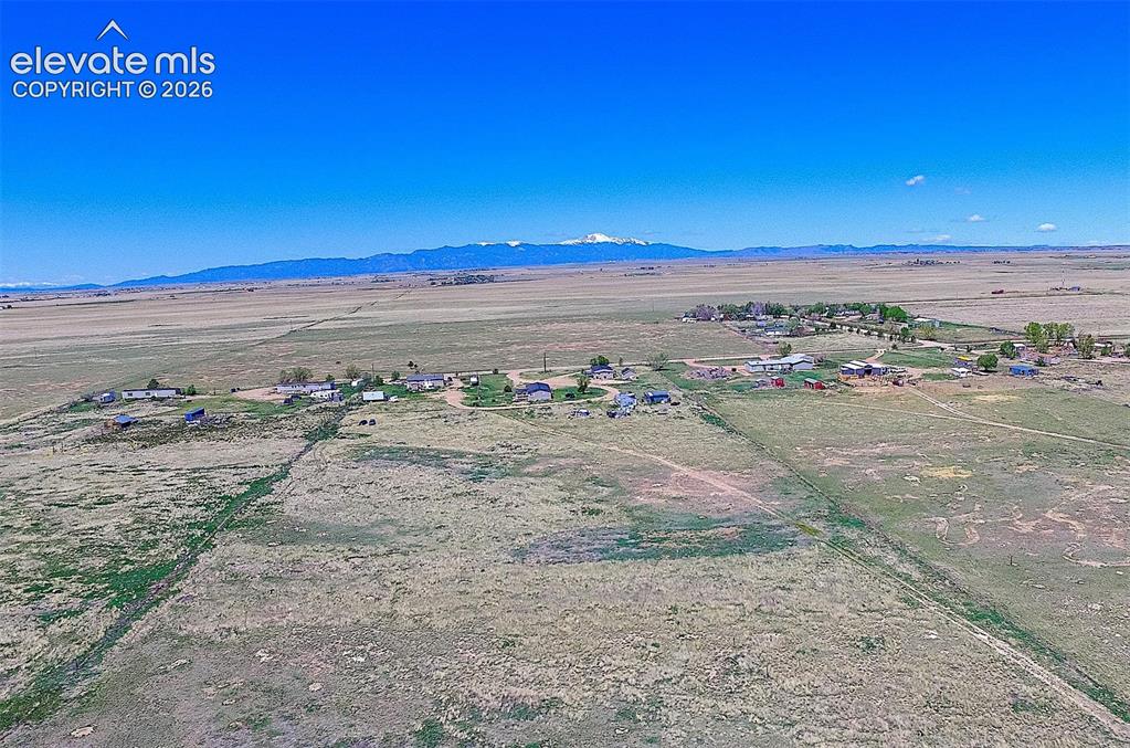 Image 2 of 25: Overview of rural landscape with mountains