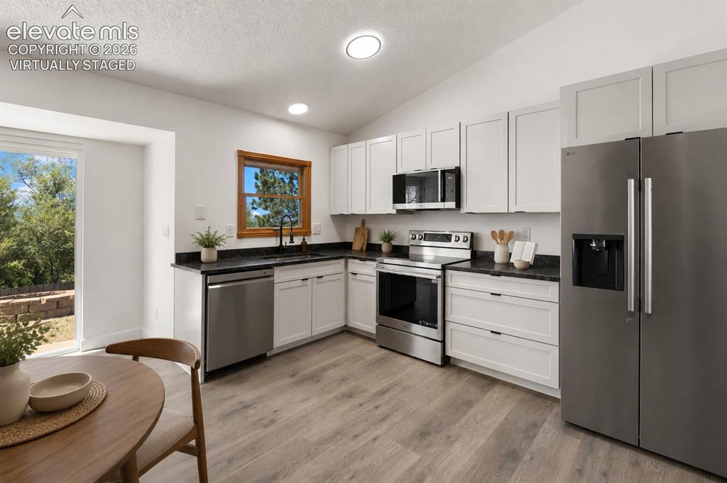 Image 2 of 31: A modern kitchen that