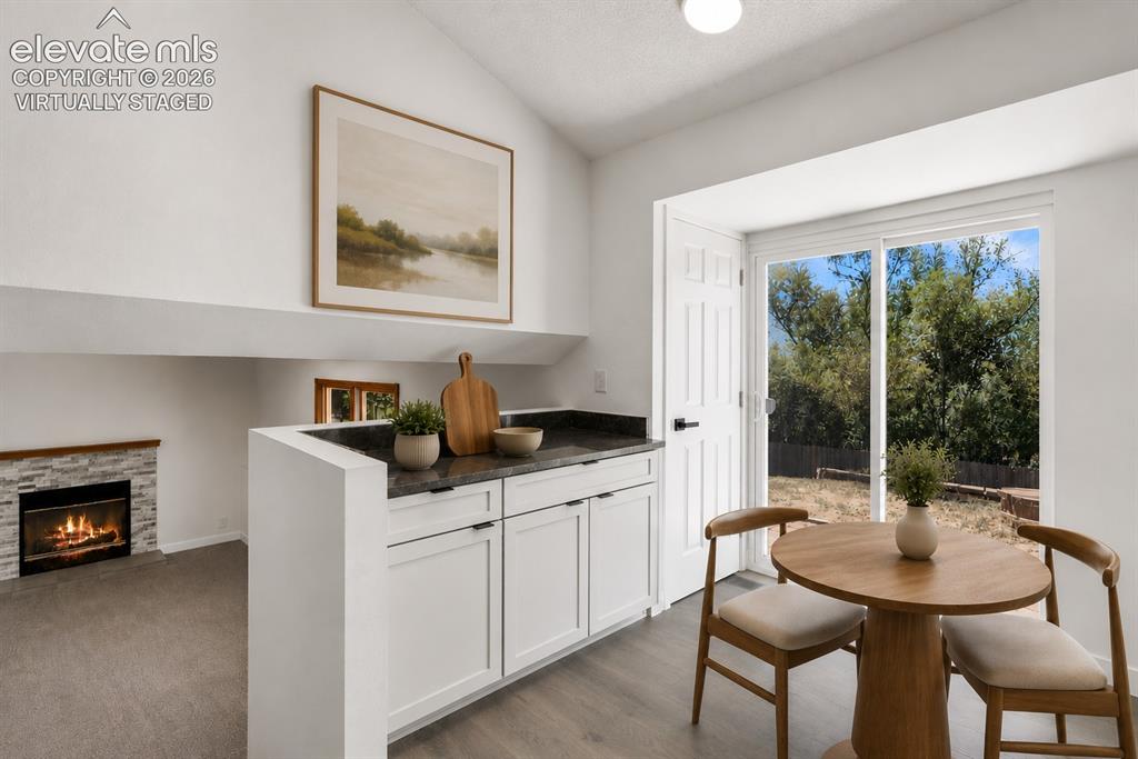 Image 3 of 31: A dinette for morning coffee (virtually staged)