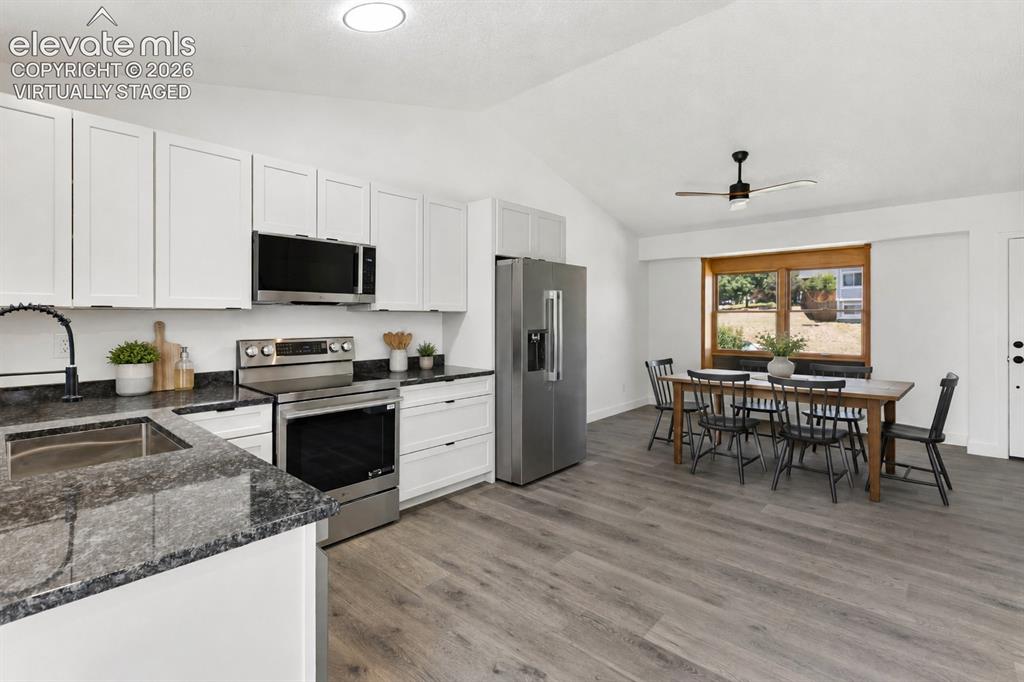 Image 4 of 31: This versatile home provides a multitude of options. (virtually staged)