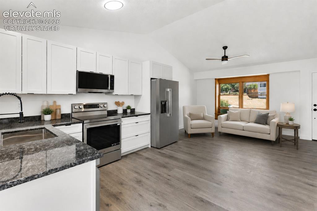 Image 5 of 31: This versatile home provides a multitude of options. (virtually staged)