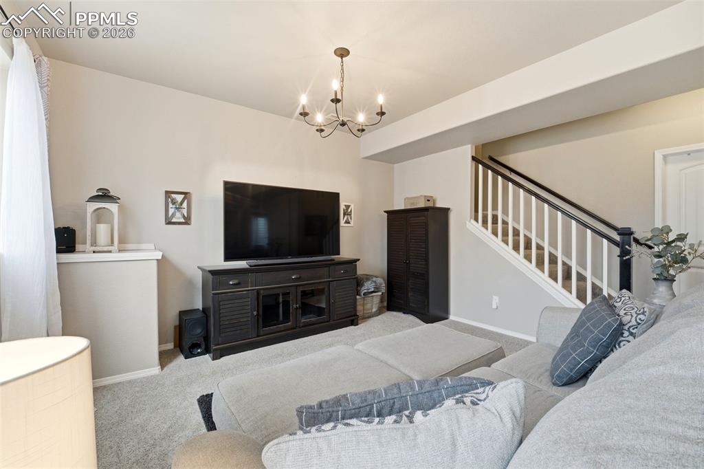 Image 30 of 48: Basement Family Room with Walkout