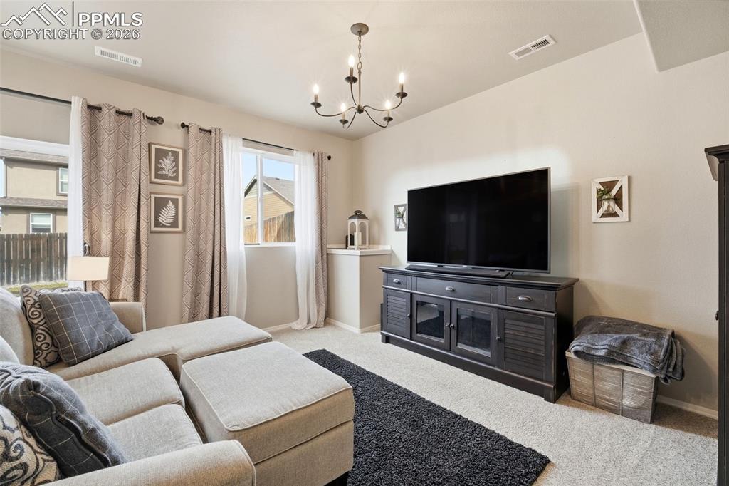 Image 31 of 48: Basement Family Room with Walkout