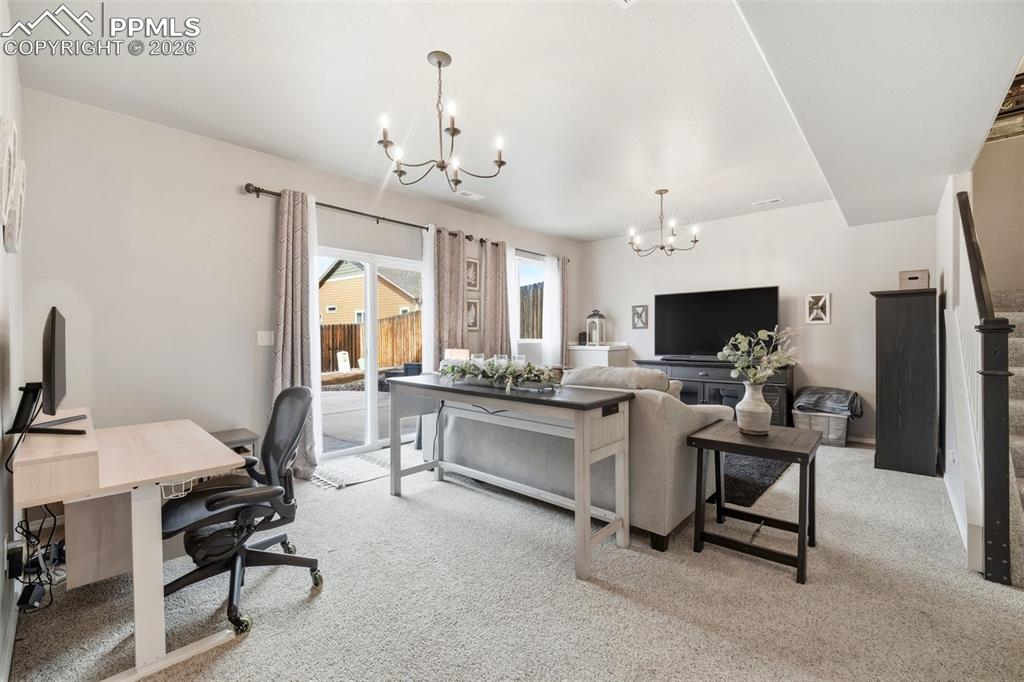 Image 32 of 48: Basement Family Room with Walkout