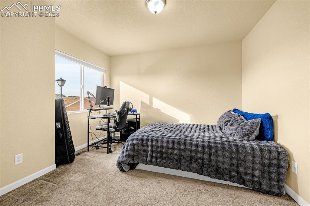 Image 13 of 36: Bedroom