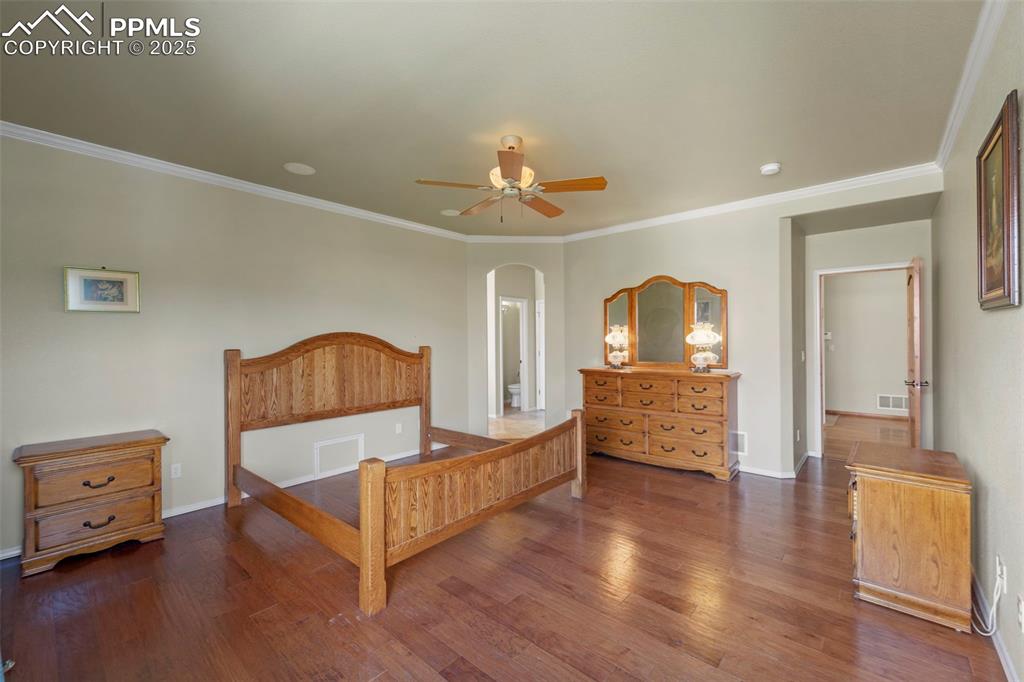 Image 11 of 33: Primary bedroom with attached 5-piece bathroom