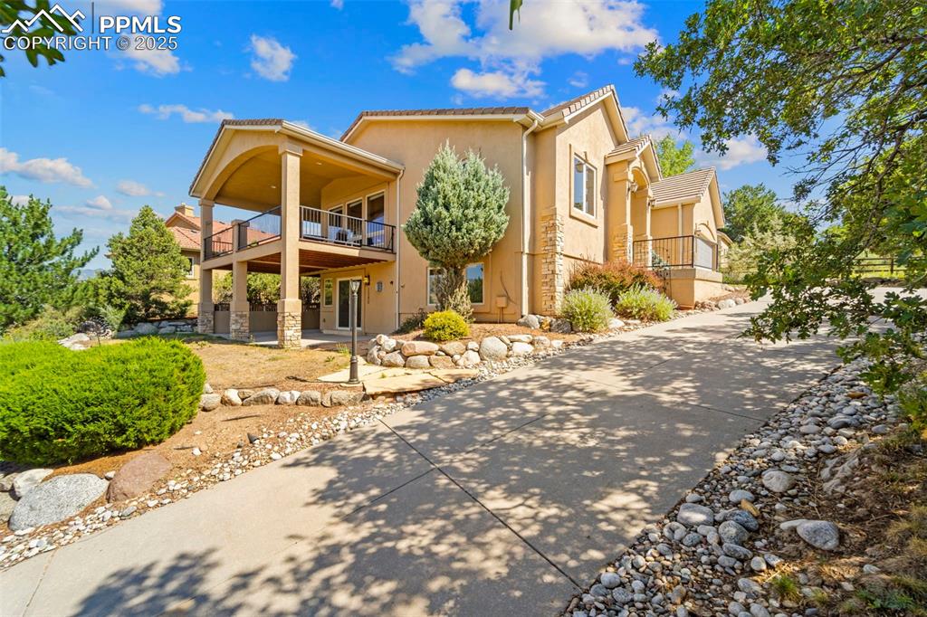 Image 2 of 33: Walkout basement with covered patio