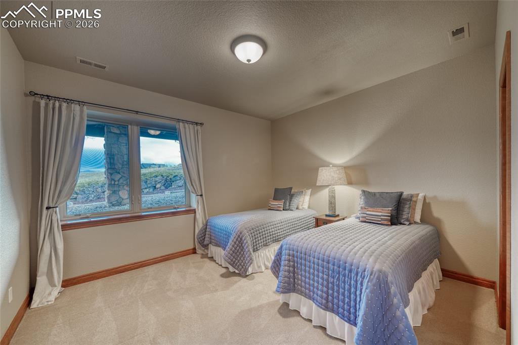 Image 40 of 50: Bedroom